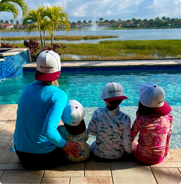 Leonard family relaxing by the pool
