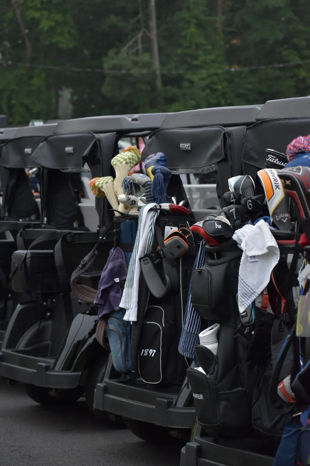 Golf club about to hit ball