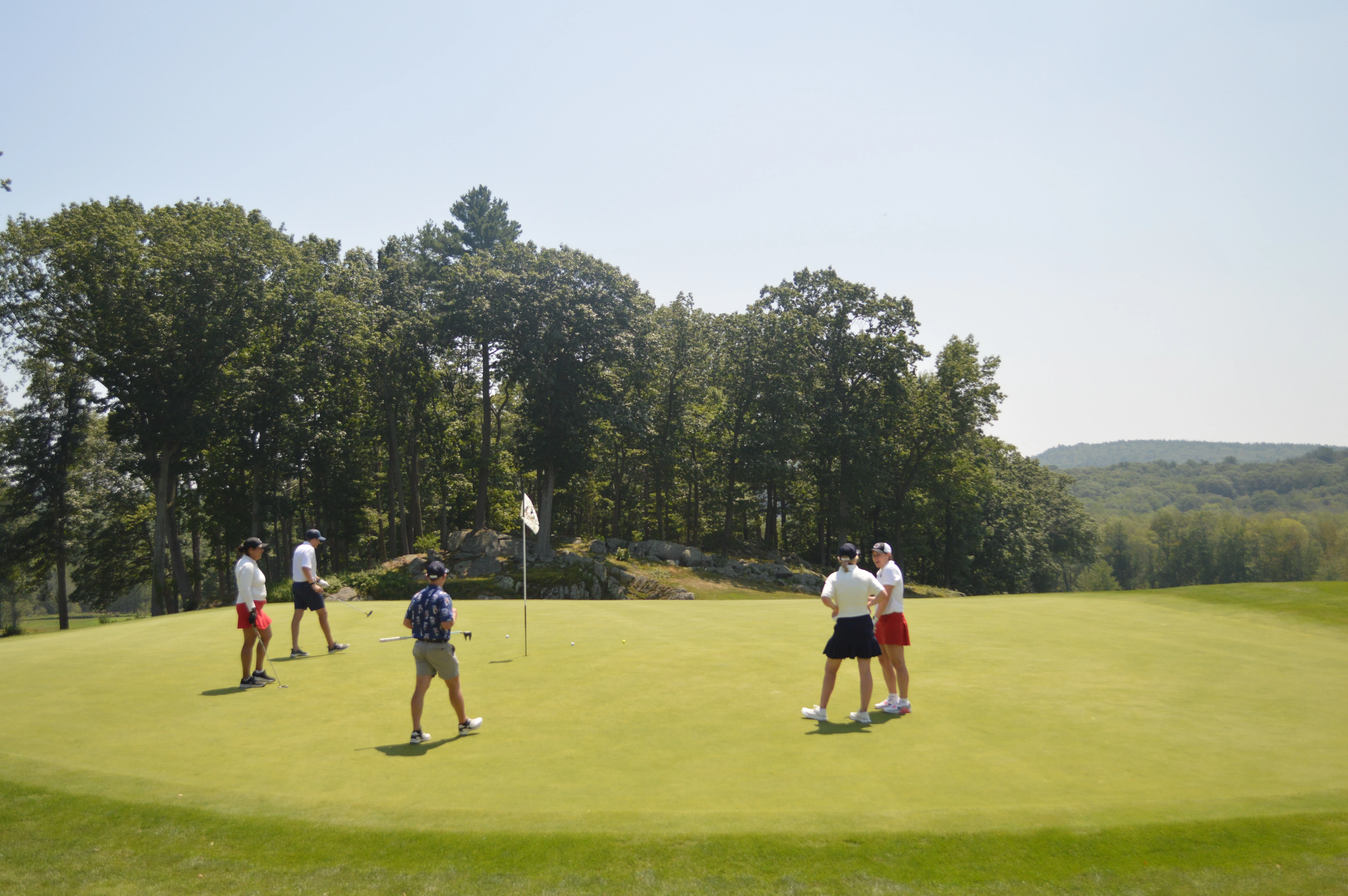 Golfer walking on golf course - view of their feet